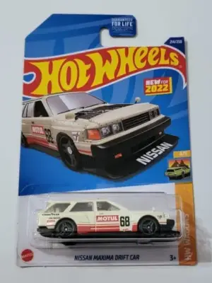 5adb7825-6154.webp Hot Wheels 2022 HW Wagons 4 of 5 Nissan Maxima Drift Car white (Motul)