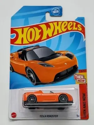 7c087581-1000004373-scaled-e1724445324199.webp Hot Wheels 2023 Then and Now 6 of 10 Tesla Roadster orange HKJ44