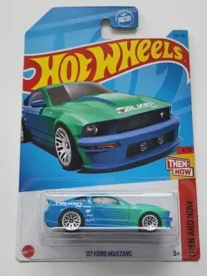 90d35048-1000004355-scaled-e1725287354935.webp Hot Wheels 2023 Then and Now - 2008 Ford Mustang blue (Falken tires drift team) HKJ43