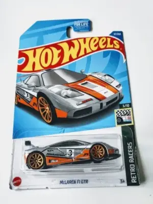 92048a93-4623.webp Hot Wheels 2022 Retro Racers 3 of 10 Mclaren F1 GT-R grey/orange HCX86
